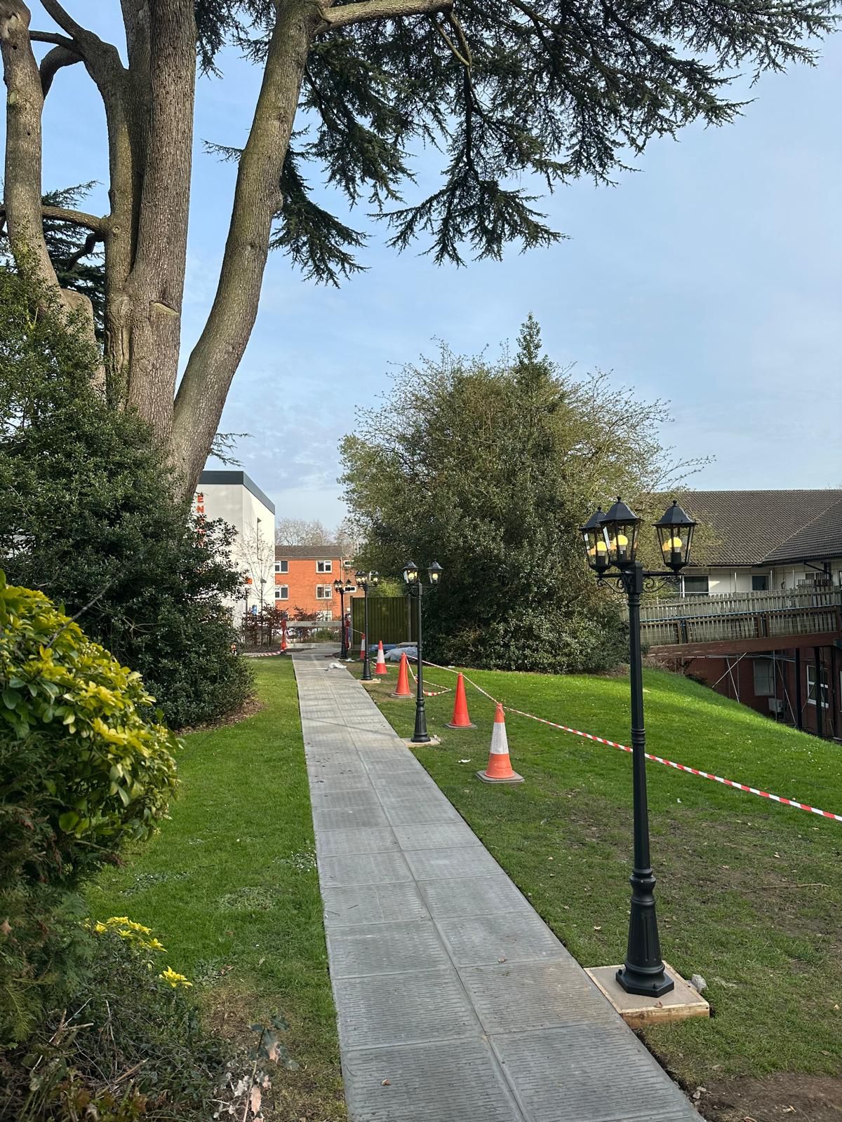 External lighting columns installed along a hospital walkway